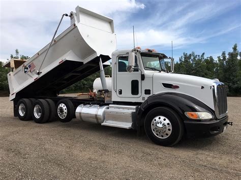 NEW TO INVENTORY 2019 Mack Granite dump truck with a 16 OX Body bed. . Super 10 dump truck for sale